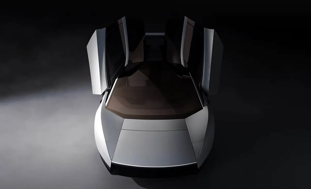 Roadster сверху-спереди в студии с двумя поднятыми вверх дверями